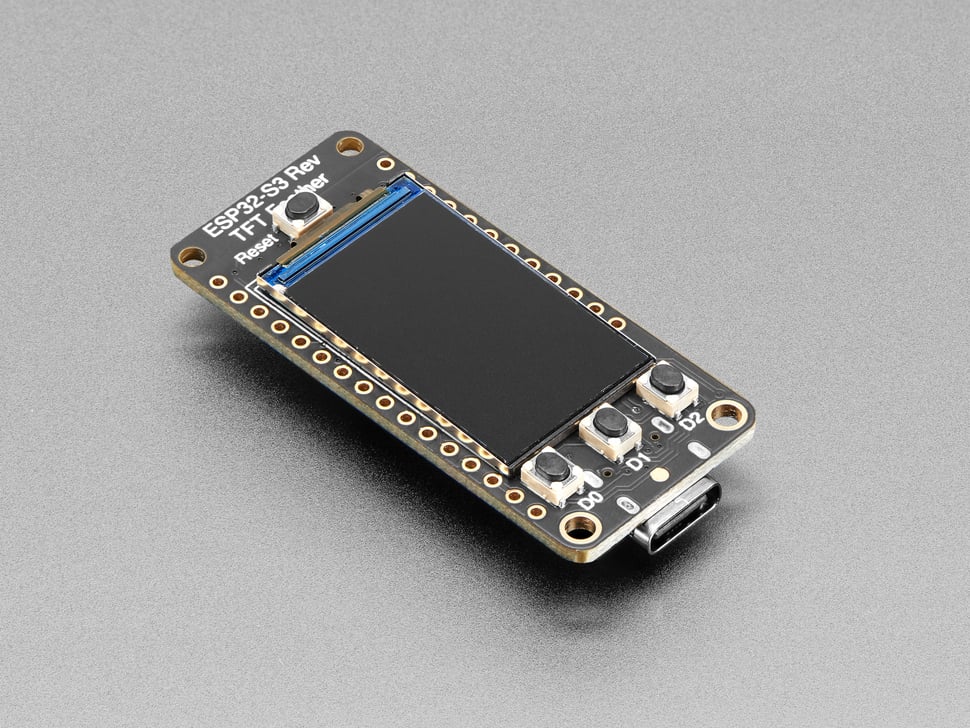 The Adafruit ESP32-S3 Reverse TFT Feather: a small black circuit board with a color display and three buttons labeled D0, D1 and D2